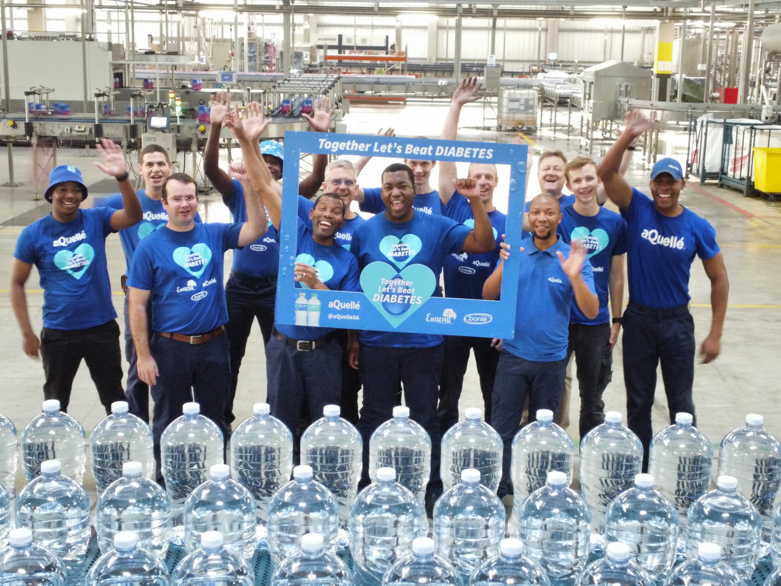 aQuellé employees wear blue on World Diabetes Day 1